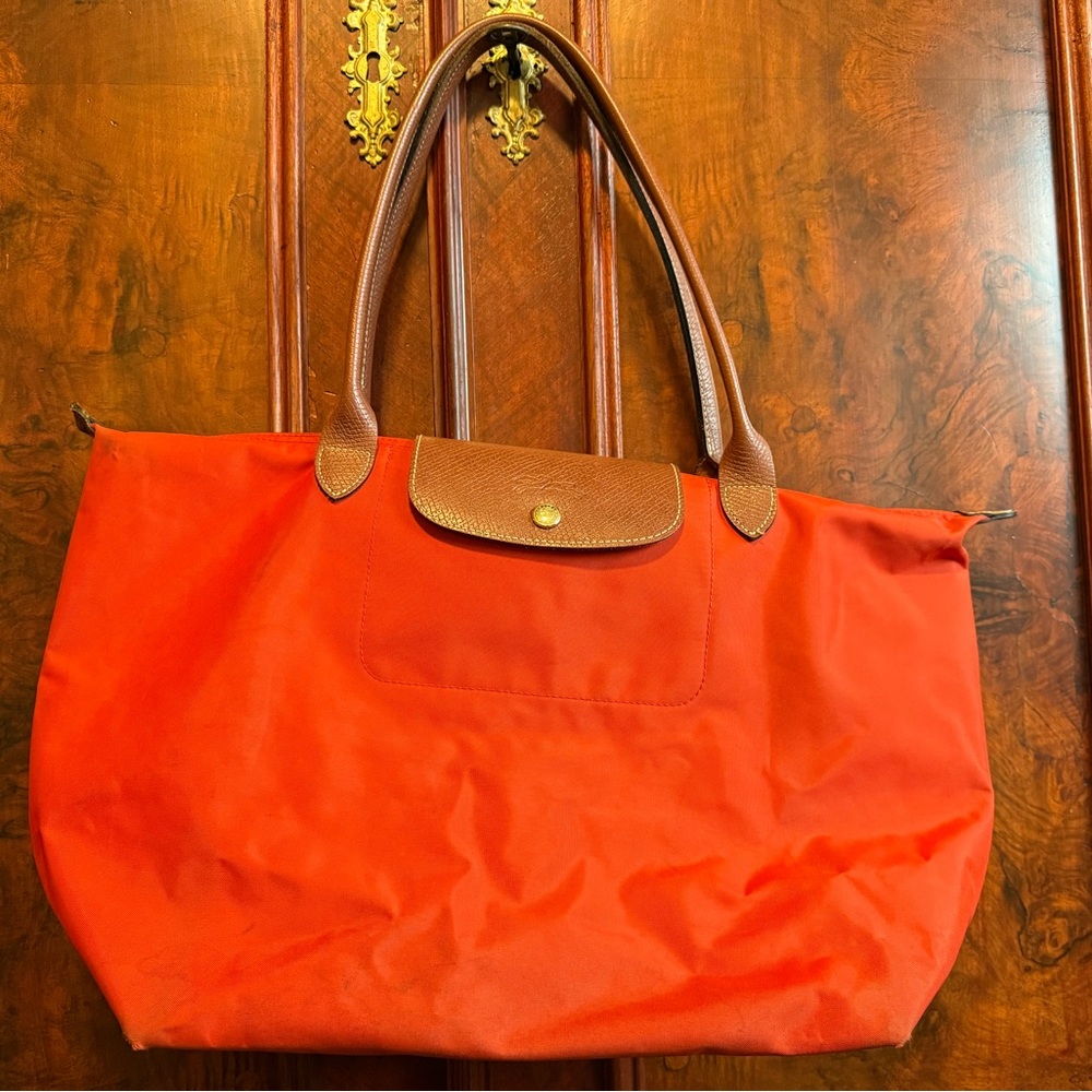 Long-champ icon le pliage Tote in orange with Brown Handles